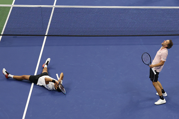 Pavic and Soares celebrate following the conclusion of the final (Image: Al Bello)