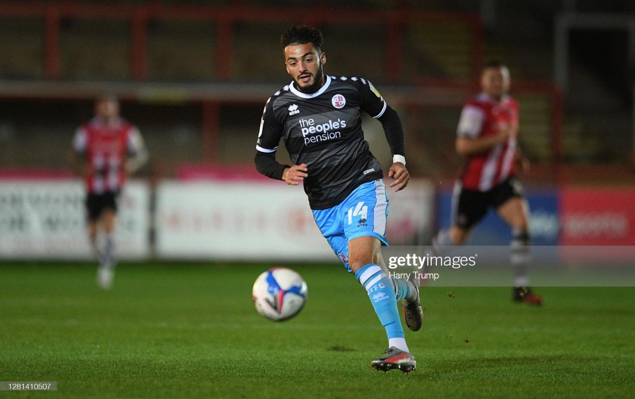EYES ON THE PRIZE: Tarryn Allarakhia chases the ball while playing for ex-club Crawley Town (Photo by Harry Trump/Getty Images)