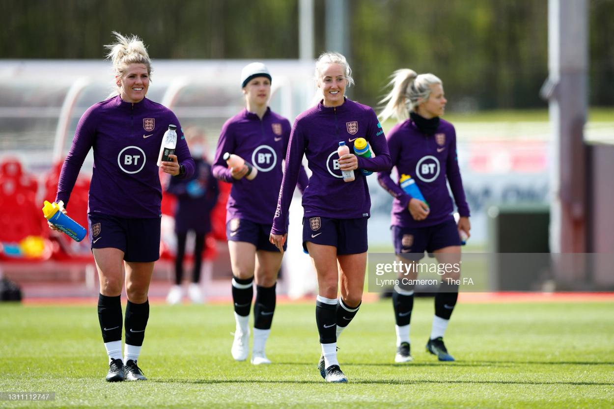 Millie Bright and Millie Turner of England look on during an England Training Session in preparation for upcoming International matches at St George's Park on April 06, 2021 in Burton upon Trent, England. (Photo by Lynne Cameron - The FA/The FA via Getty Images)