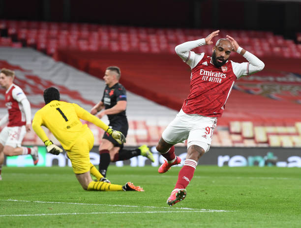 Lacazette hit the bar with a great chance Photo by Stuart MacFarlane via Getty Images