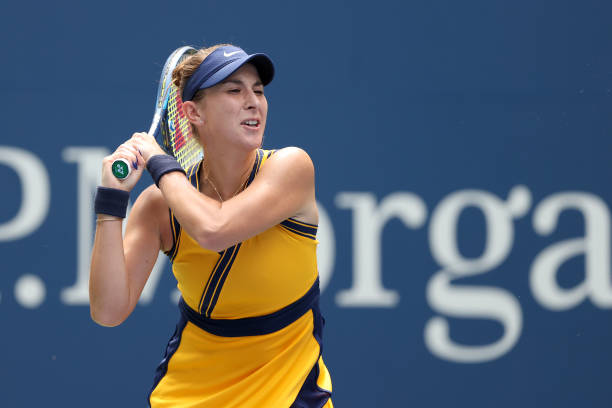 Bencic follows through on a backhand/Photo: Al Bello/Getty Images