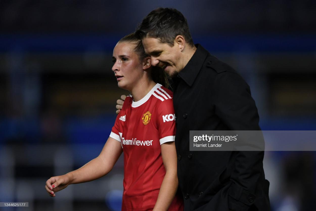 Marc Skinner, Manager of Manchester United speaks with Ella Toone of Manchester United at half time during the Barclays FA Women's Super League match between Birmingham City Women and Manchester United Women at St Andrew's Trillion Trophy Stadium on October 03, 2021 in Birmingham, England. (Photo by Harriet Lander/Getty Images)
