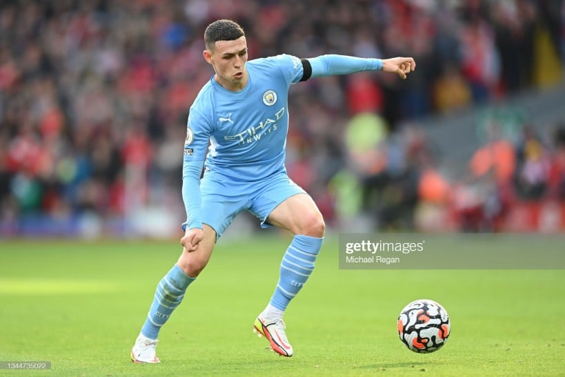 LIVERPOOL, ENGLAND - OCTOBER 03: Phil Foden of Manchester City in action during the <b><a  data-cke-saved-href='https://www.vavel.com/en/data/premier-league' href='https://www.vavel.com/en/data/premier-league'>Premier League</a></b> match between Liverpool and Manchester City at Anfield on October 03, 2021 in Liverpool, England. (Photo by Michael Regan/Getty Images)