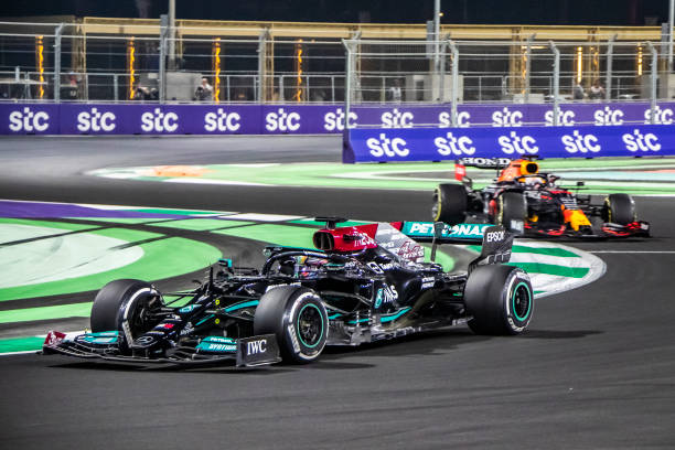 Lewis Hamilton in the final stage of the race ahead of Max Verstappen during the Grand Prix Formula One of Saudi Arabia on December 05, 2021 in Jeddah, Saudi Arabia. (Photo by Cristiano Barni ATPImages/Getty Images)