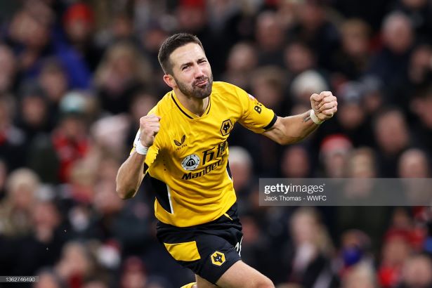 MANCHESTER, ENGLAND - JANUARY 03: <strong><a  data-cke-saved-href='https://vavel.com/en/football/2021/08/24/wolverhampton-wanderers/1083431-nottingham-forest-0-4-wolves-commanding-performance-in-bruno-lages-first-victory.html' href='https://vavel.com/en/football/2021/08/24/wolverhampton-wanderers/1083431-nottingham-forest-0-4-wolves-commanding-performance-in-bruno-lages-first-victory.html'>Joao Moutinho</a></strong> of <strong><a  data-cke-saved-href='https://vavel.com/en/football/2021/06/16/leicester-city/1074966-leicester-citys-2021-premier-league-fixture-list-released.html' href='https://vavel.com/en/football/2021/06/16/leicester-city/1074966-leicester-citys-2021-premier-league-fixture-list-released.html'>Wolverhampton Wanderers</a></strong> celebrates after scoring his team's first goal during the Premier League match between Manchester United and <strong><a  data-cke-saved-href='https://vavel.com/en/football/2021/06/16/leicester-city/1074966-leicester-citys-2021-premier-league-fixture-list-released.html' href='https://vavel.com/en/football/2021/06/16/leicester-city/1074966-leicester-citys-2021-premier-league-fixture-list-released.html'>Wolverhampton Wanderers</a></strong> at Old Trafford on January 03, 2022 in Manchester, England. (Photo by Jack Thomas - WWFC/Wolves via Getty Images)