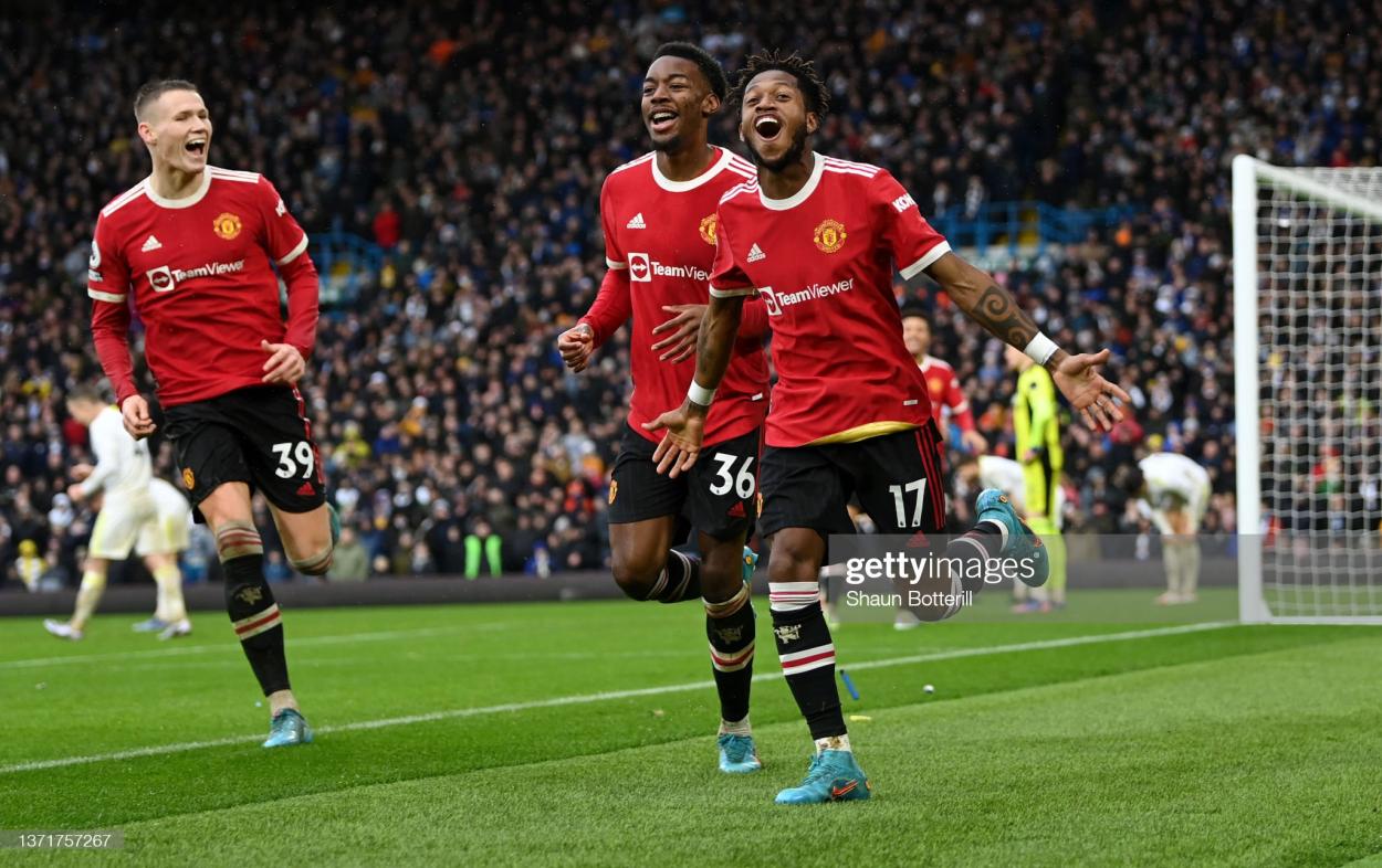 LEEDS, ENGLAND - FEBRUARY 20: Anthony Elanga of Manchester United celebrates with fans after their sides victory during the <b><a  data-cke-saved-href='https://www.vavel.com/en/data/premier-league' href='https://www.vavel.com/en/data/premier-league'>Premier League</a></b> match between Leeds United and Manchester United at Elland Road on February 20, 2022 in Leeds, England. (Photo by Shaun Botterill/Getty Images)