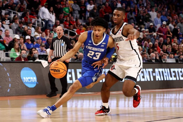 Trey Alexander of Creighton drives past Lamont Butler of San Diego State during the Bluejays' first round NCAA Tournament victory/Photo: Tom Pennington/Getty Images