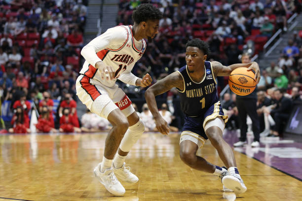 Xavier Bishop of Montana State tries to drive past Mylik Jackson of <strong><a  data-cke-saved-href='https://www.vavel.com/en-us/ncaa/2014/10/08/college-basketball/400997.html' href='https://www.vavel.com/en-us/ncaa/2014/10/08/college-basketball/400997.html'>Texas Tech</a></strong> during the Red Raiders' first-round victory/Photo: Sean M. Haffey/Getty Images