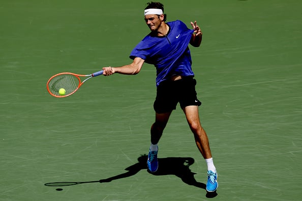 Taylor Fritz hitting a forehand at the Western and Southern Open (Matthew Stockman/Getty Images)