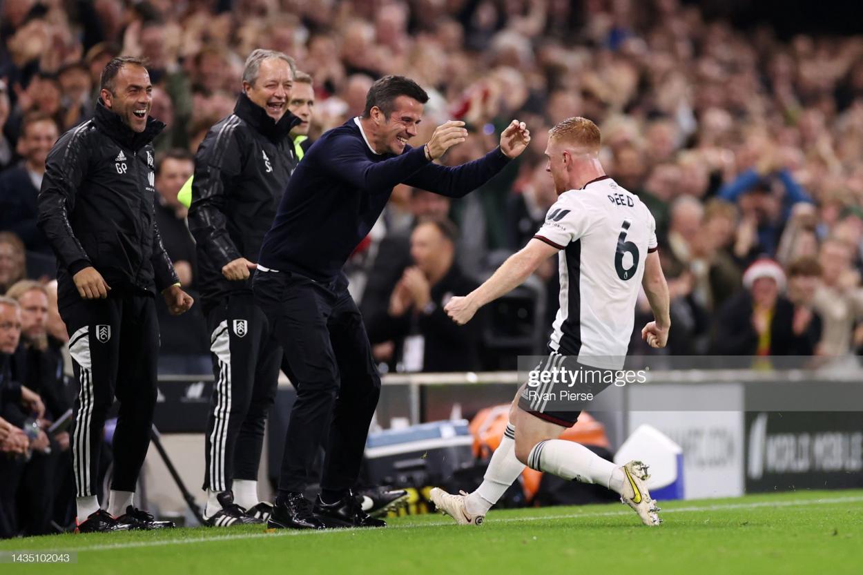 LONDON, ENGLAND - OCTOBER 20: Harrison Reed of Fulham celebrates with <strong><a  data-cke-saved-href='https://www.vavel.com/en/football/2022/08/06/fulham/1119059-almost-perfect-performance-marco-silva-praises-his-fulham-players-after-holding-liverpool-2-2.html' href='https://www.vavel.com/en/football/2022/08/06/fulham/1119059-almost-perfect-performance-marco-silva-praises-his-fulham-players-after-holding-liverpool-2-2.html'>Marco Silva,</a></strong> Manager of Fulham after scoring their sides first goal during the <strong><a  data-cke-saved-href='https://www.vavel.com/en/football/2022/08/04/fulham/1118877-fulham-vs-liverpool-premier-league-preview-gameweek-1-2022.html' href='https://www.vavel.com/en/football/2022/08/04/fulham/1118877-fulham-vs-liverpool-premier-league-preview-gameweek-1-2022.html'>Premier League</a></strong> match between Fulham FC and Aston Villa at Craven Cottage on October 20, 2022 in London, England. (Photo by Ryan Pierse/Getty Images)