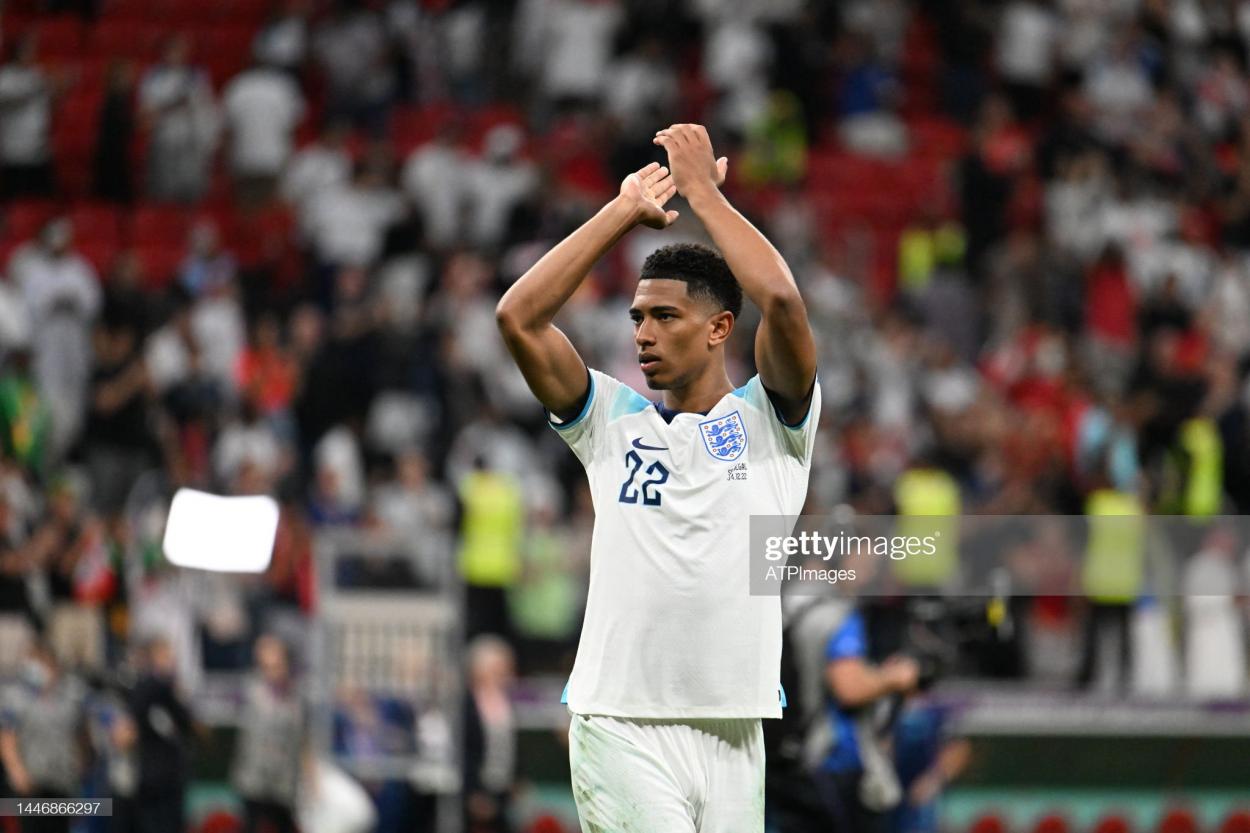AL KHOR, QATAR - DECEMBER 04: <strong><a  data-cke-saved-href='https://www.vavel.com/en/international-football/2022/12/04/1131392-england-3-0-senegal-england-set-up-tie-with-holders-france-after-cruising-past-senegal.html' href='https://www.vavel.com/en/international-football/2022/12/04/1131392-england-3-0-senegal-england-set-up-tie-with-holders-france-after-cruising-past-senegal.html'>Jude Bellingham</a></strong> of England celebrates during the <strong><a  data-cke-saved-href='https://www.vavel.com/en/international-football/2022/12/08/1131659-morocco-vs-portugal-pre-match-analysis.html' href='https://www.vavel.com/en/international-football/2022/12/08/1131659-morocco-vs-portugal-pre-match-analysis.html'>FIFA World Cup</a></strong> Qatar 2022 Round of 16 match between England and Senegal at Al Bayt Stadium on December 04, 2022 in Al Khor, Qatar. (Photo by Anthony Stanley ATPImages/Getty Images)