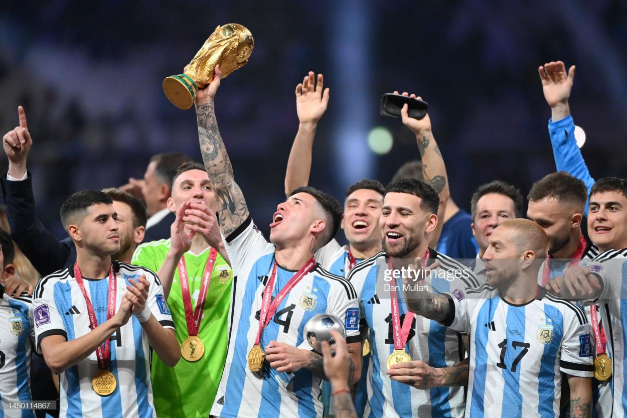 Enzo Fernandez lifts the World Cup trophy (Photo by Dan Mullan/Getty Images)