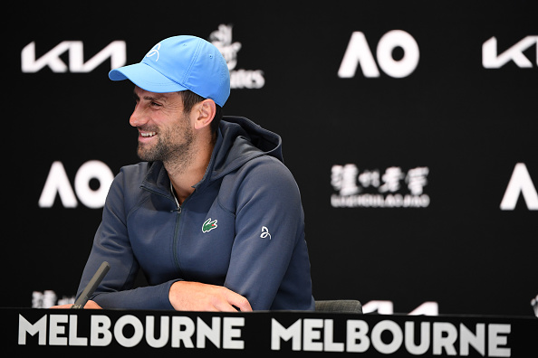 Djokovic all smiles during his pre-tournament Australian Open presser (James Morgan/Getty Images)