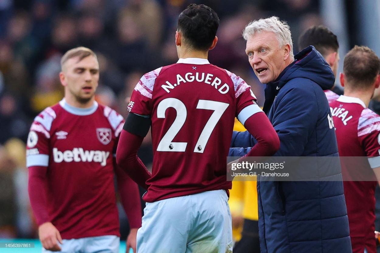 WOLVERHAMPTON, ENGLAND - JANUARY 14: <strong><a  data-cke-saved-href='https://www.vavel.com/en/football/2022/10/14/west-ham/1126239-david-moyes-predicts-a-difficult-game-against-southampton.html' href='https://www.vavel.com/en/football/2022/10/14/west-ham/1126239-david-moyes-predicts-a-difficult-game-against-southampton.html'>David Moyes</a></strong>, manager of <strong><a  data-cke-saved-href='https://www.vavel.com/en/football/2022/10/27/west-ham/1127727-west-ham-1-0-silkeborg-hammers-win-their-europa-conference-league-group-thanks-to-manuel-lanzinis-penalty.html' href='https://www.vavel.com/en/football/2022/10/27/west-ham/1127727-west-ham-1-0-silkeborg-hammers-win-their-europa-conference-league-group-thanks-to-manuel-lanzinis-penalty.html'>West Ham</a></strong> United, issues instructions to Nayef Aguerd during the <strong><a  data-cke-saved-href='https://www.vavel.com/en/football/2022/09/30/west-ham/1124691-david-moyes-admits-he-is-judged-on-results-and-they-need-to-get-better-ahead-of-wolves-fixture.html' href='https://www.vavel.com/en/football/2022/09/30/west-ham/1124691-david-moyes-admits-he-is-judged-on-results-and-they-need-to-get-better-ahead-of-wolves-fixture.html'>Premier League</a></strong> match between Wolverhampton Wanderers and <strong><a  data-cke-saved-href='https://www.vavel.com/en/football/2022/10/27/west-ham/1127727-west-ham-1-0-silkeborg-hammers-win-their-europa-conference-league-group-thanks-to-manuel-lanzinis-penalty.html' href='https://www.vavel.com/en/football/2022/10/27/west-ham/1127727-west-ham-1-0-silkeborg-hammers-win-their-europa-conference-league-group-thanks-to-manuel-lanzinis-penalty.html'>West Ham</a></strong> United at Molineux on January 14, 2023 in Wolverhampton, England. (Photo by James Gill - Danehouse/Getty Images)