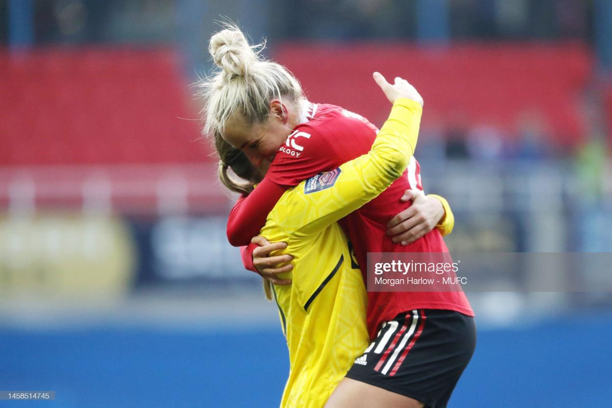 Mary Earps and <strong><a  data-cke-saved-href='https://www.vavel.com/en/football/2023/02/26/womens-football/1138972-vitality-womens-fa-cup-round-up-a-day-of-dramatic-wins-and-heavyweight-knockouts.html' href='https://www.vavel.com/en/football/2023/02/26/womens-football/1138972-vitality-womens-fa-cup-round-up-a-day-of-dramatic-wins-and-heavyweight-knockouts.html'>Millie Turner</a></strong> of <strong><a  data-cke-saved-href='https://www.vavel.com/en/football/2023/03/21/womens-football/1141338-everton-vs-liverpool-womens-super-league-preview-gameweek-16-2023.html' href='https://www.vavel.com/en/football/2023/03/21/womens-football/1141338-everton-vs-liverpool-womens-super-league-preview-gameweek-16-2023.html'>Manchester United</a></strong> celebrate victory after the FA Women's Super League match between Reading and <strong><a  data-cke-saved-href='https://www.vavel.com/en/football/2023/03/21/womens-football/1141338-everton-vs-liverpool-womens-super-league-preview-gameweek-16-2023.html' href='https://www.vavel.com/en/football/2023/03/21/womens-football/1141338-everton-vs-liverpool-womens-super-league-preview-gameweek-16-2023.html'>Manchester United</a></strong> at Select Car Leasing Stadium on January 22, 2023 in Reading, England. (Photo by Morgan Harlow - MUFC/Manchester United via Getty Images)