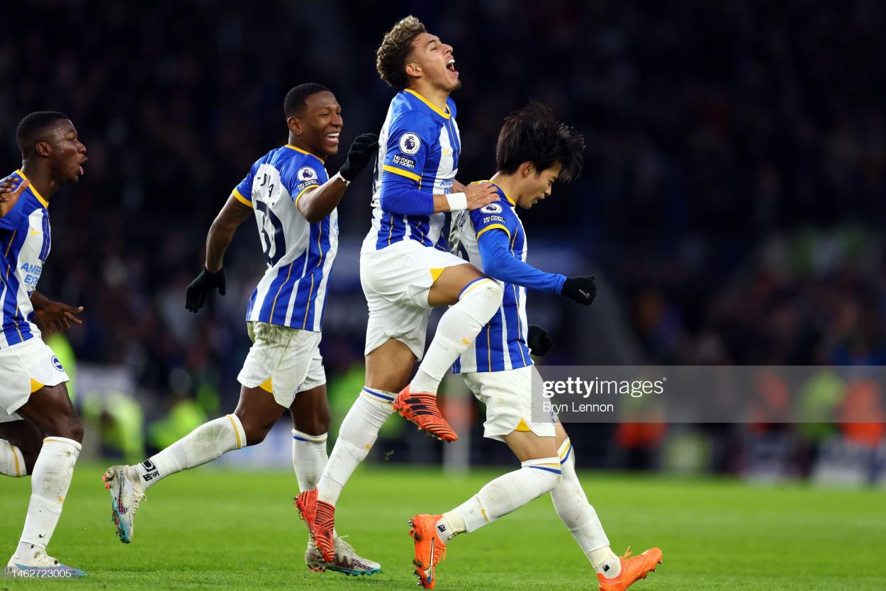 Kaoru Mitoma (r) of Brighton & Hove Albion celebrates after scoring with team mate Jeremy Sarmiento (c) during the Premier League match between Brighton & Hove Albion and AFC Bournemouth at American Express Community Stadium on February 04, 2023 in Brighton, England. (Photo by Bryn Lennon/Getty Images)