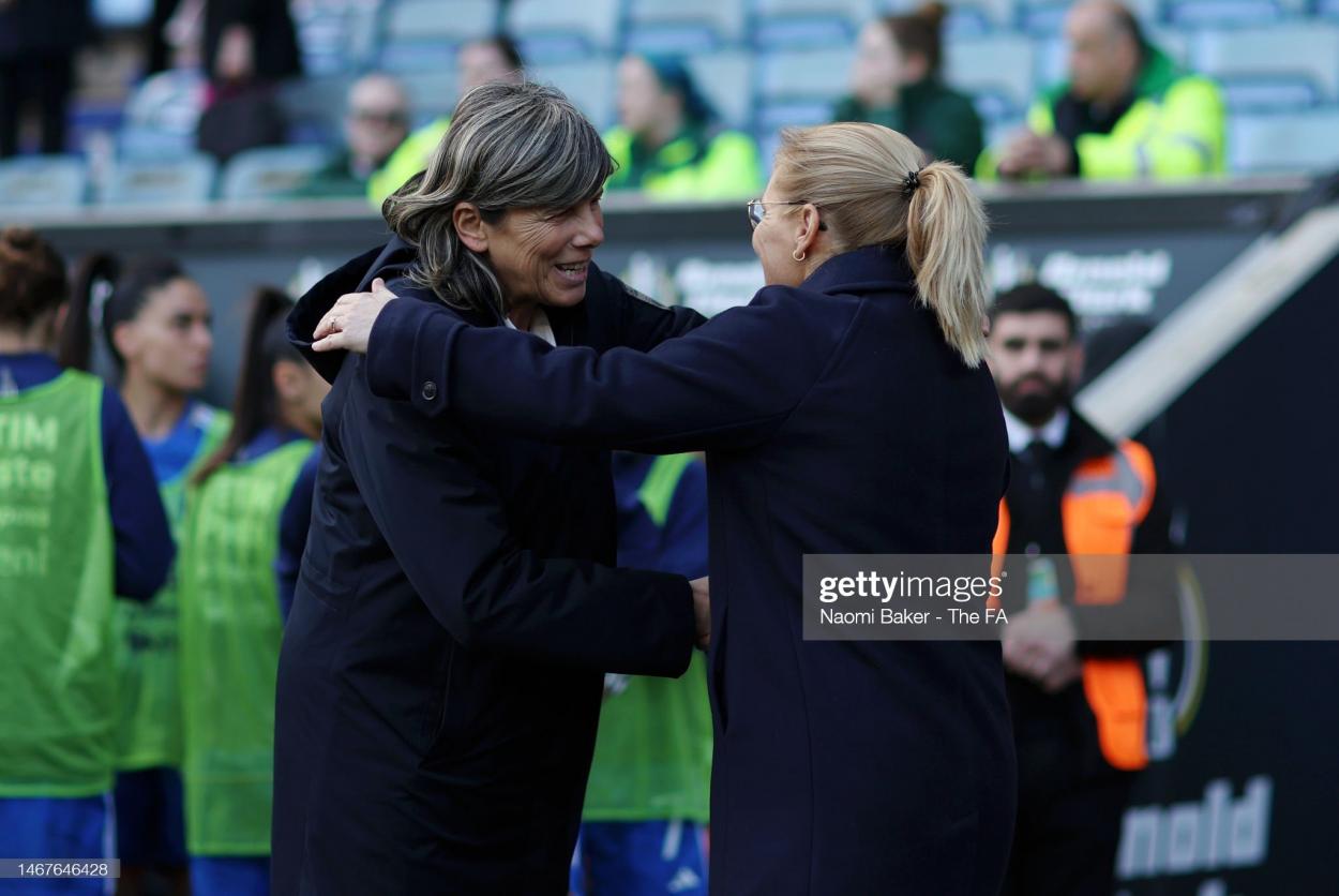 Milena Bertolini, Head Coach of Italy shakes hands with Sarina Wiegman, Manager of England, prior to the Arnold Clark Cup match between England and Italy at CBS Arena on February 19, 2023 in Coventry, England. (Photo by Naomi Baker - The FA/The FA via Getty Images)