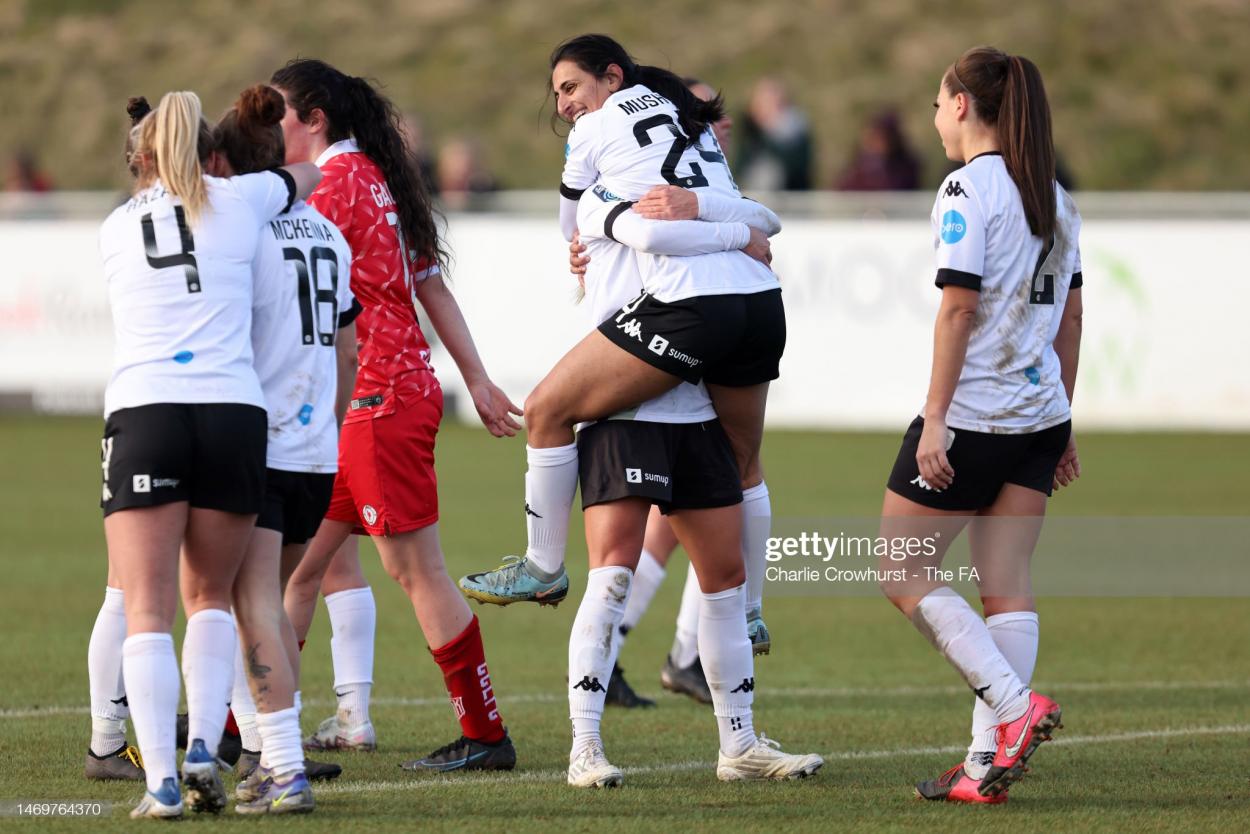 Aqsa Mushtaq of Lewes celebrates with teammates after scoring the team's fourth goal during the Vitality Women's FA Cup Fifth Round match between Lewes and Cardiff City at The Dripping Pan on February 26, 2023 in Lewes, England. (Photo by Charlie Crowhurst - The FA/The FA via Getty Images)