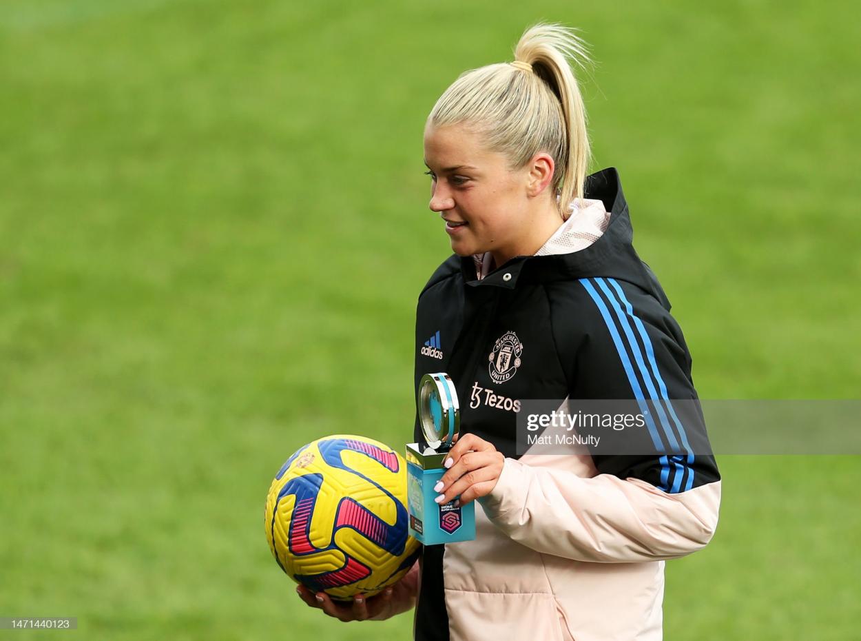 Alessia Russo of <strong><a  data-cke-saved-href='https://www.vavel.com/en/football/2023/03/07/womens-football/1139860.html' href='https://www.vavel.com/en/football/2023/03/07/womens-football/1139860.html'>Manchester United</a></strong> holds the match ball and player of the match trophy after scoring a hat-trick following the FA Women's Super League match between <strong><a  data-cke-saved-href='https://www.vavel.com/en/football/2023/03/05/womens-football/1139645-everton-vs-aston-villa-womens-super-league-preview-gameweek-14-2023.html' href='https://www.vavel.com/en/football/2023/03/05/womens-football/1139645-everton-vs-aston-villa-womens-super-league-preview-gameweek-14-2023.html'>Manchester United</a></strong> and Leicester City at Leigh Sports Village on March 05, 2023 in Leigh, England. (Photo by Matt McNulty/Getty Images)
