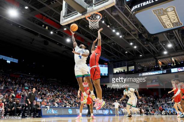 Jalen Jackson of Texas A&M-Corpus Christi drives past Southeast Missouri State's Josh Earley for a layup during their First Four game in the NCAA Tournament/Photo: Andy Lyons/Getty Images