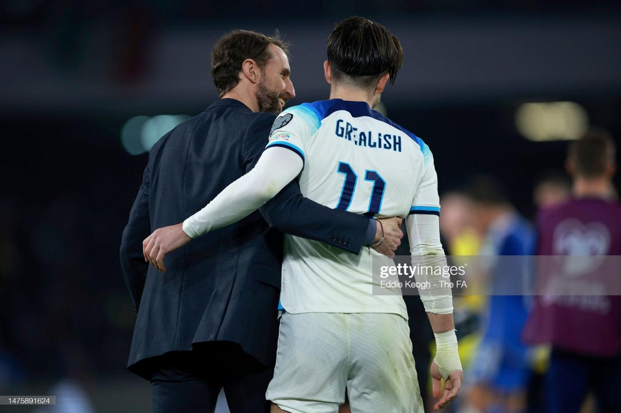 <strong><a  data-cke-saved-href='https://www.vavel.com/en/international-football/2023/03/22/1141488-southgate-italy-have-shown-no-one-can-take-qualification-for-granted.html' href='https://www.vavel.com/en/international-football/2023/03/22/1141488-southgate-italy-have-shown-no-one-can-take-qualification-for-granted.html'>Gareth Southgate</a></strong> celebrates with Jack Grealish of England in Naples, Italy. (Photo by Eddie Keogh - The FA/The FA via Getty Images)