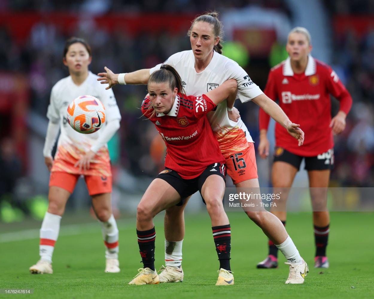 <strong><a  data-cke-saved-href='https://www.vavel.com/en/football/2023/03/11/womens-football/1140391-emma-hayes-will-have-them-fired-up-marc-skinner-previews-difficult-clash-against-chelsea.html' href='https://www.vavel.com/en/football/2023/03/11/womens-football/1140391-emma-hayes-will-have-them-fired-up-marc-skinner-previews-difficult-clash-against-chelsea.html'>Ella Toone</a></strong> of Manchester United holds off Lucy Parker of West Ham United during the FA Women's Super League match between Manchester United and West Ham United at Old Trafford on March 25, 2023 in Manchester, England. (Photo by Matt Lewis - The FA/The FA via Getty Images)