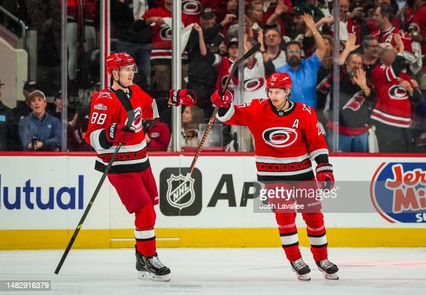 <strong><a  data-cke-saved-href='https://www.vavel.com/en-us/nhl/2021/05/21/1072190-2021-stanley-cup-playoffs-aho-nedeljkovic-lead-hurricanes-past-predators-in-game-2.html' href='https://www.vavel.com/en-us/nhl/2021/05/21/1072190-2021-stanley-cup-playoffs-aho-nedeljkovic-lead-hurricanes-past-predators-in-game-2.html'>Sebastian Aho</a></strong> (r.) is congratulated by teammate Martin Necas after opening the scoring in Game 1/Photo: Josh Lavalee/Getty Images