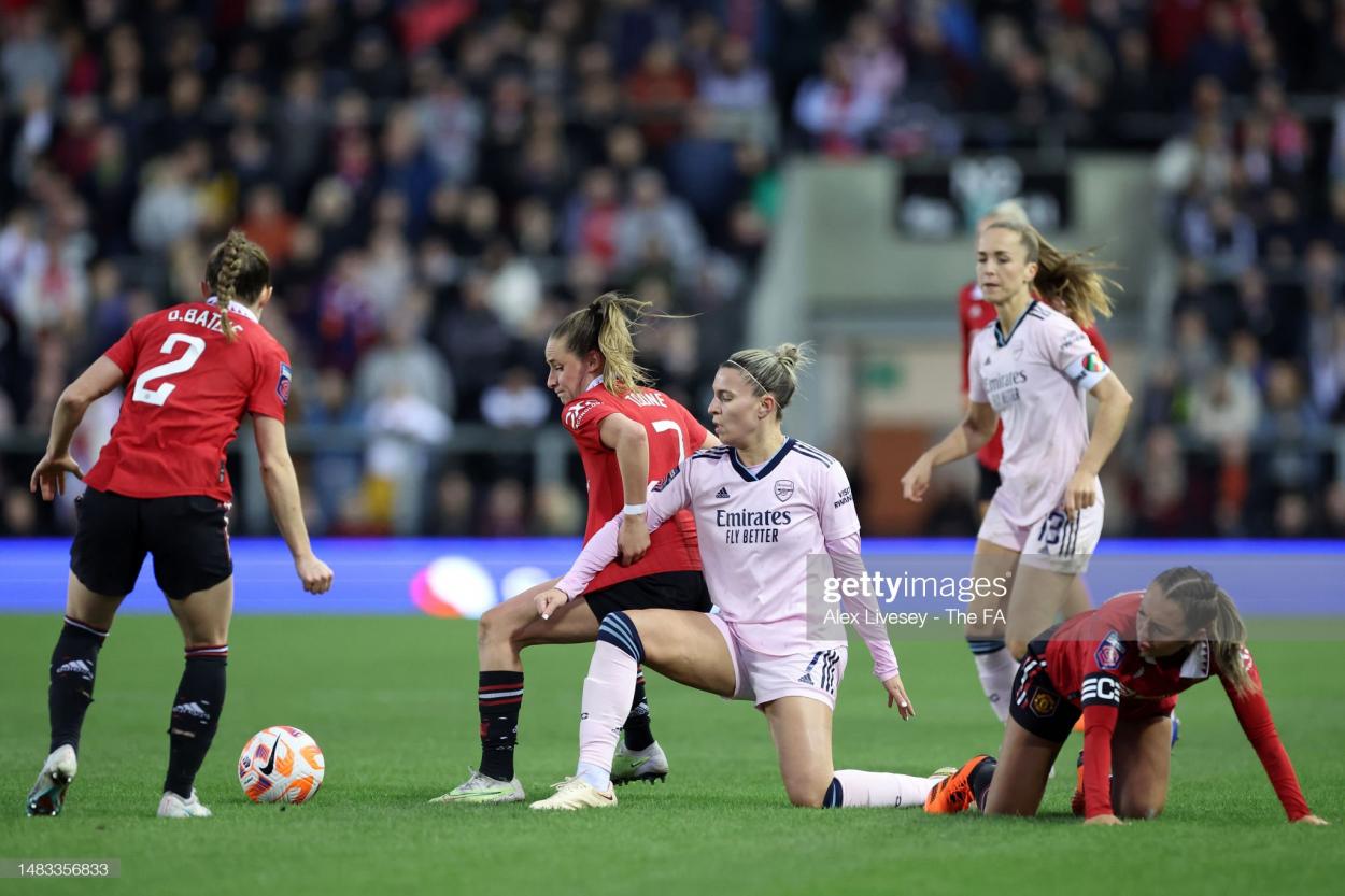 Ella Toone of Manchester United battles for possession with Steph Catley of Arsenal during the FA Women's Super League match between Manchester United and Arsenal at Leigh Sports Village on April 19, 2023 in Leigh, England. (Photo by Alex Livesey - The FA/The FA via Getty Images)