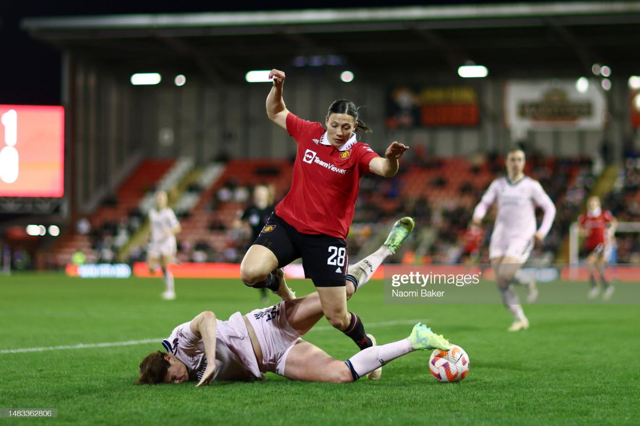 Rachel Williams of Manchester United battles for possession with Jennifer Beattie of Arsenal during the FA Women's Super League match between Manchester United and Arsenal at Leigh Sports Village on April 19, 2023 in Leigh, England. (Photo by Naomi Baker/Getty Images )
