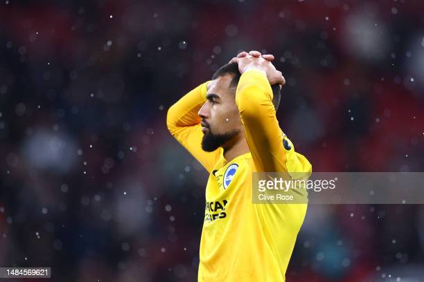 <strong><a  data-cke-saved-href='https://www.vavel.com/en/football/2023/05/14/premier-league/1146770-roberto-de-zerbi-praises-brightons-courage-as-arsenal-are-brushed-aside.html' href='https://www.vavel.com/en/football/2023/05/14/premier-league/1146770-roberto-de-zerbi-praises-brightons-courage-as-arsenal-are-brushed-aside.html'>Robert Sanchez</a></strong> looks dejected following the team's defeat in the penalty shoot out (Photo by Clive Rose/Getty Images)