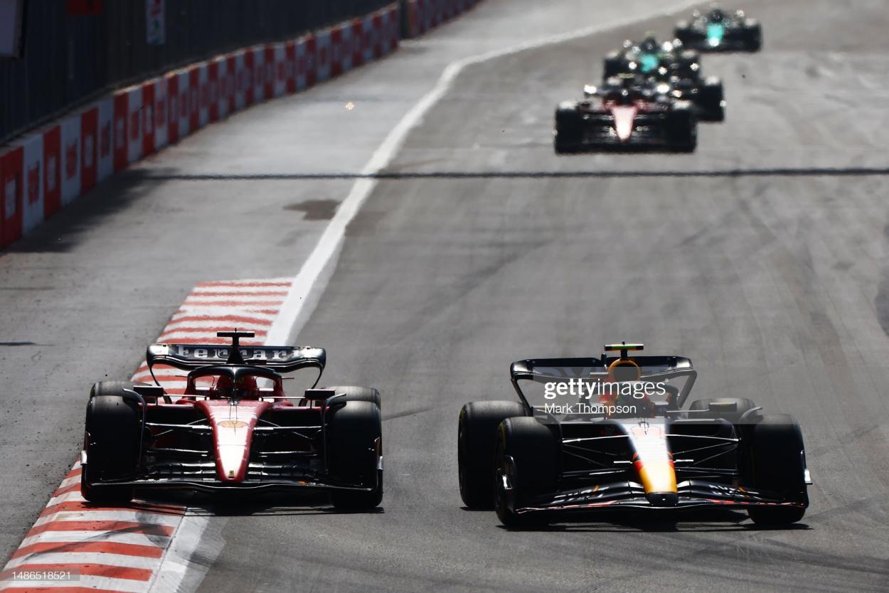 BAKU, AZERBAIJAN - APRIL 30: <strong><a  data-cke-saved-href='https://www.vavel.com/en/motorsports/2023/04/02/formula-1/1142597-max-verstappen-describes-his-australian-grand-prix-win-as-very-chaotic-and-a-bit-of-a-mess.html' href='https://www.vavel.com/en/motorsports/2023/04/02/formula-1/1142597-max-verstappen-describes-his-australian-grand-prix-win-as-very-chaotic-and-a-bit-of-a-mess.html'>Sergio Perez</a></strong> of Mexico driving the (11) Oracle Red Bull Racing RB19 overtakes <strong><a  data-cke-saved-href='https://www.vavel.com/en/motorsports/2023/03/20/formula-1/1141292-saudi-arabia-grand-prix-driver-ratings-perez-heads-up-rb-1-2-alonso-claims-bemusing-podium.html' href='https://www.vavel.com/en/motorsports/2023/03/20/formula-1/1141292-saudi-arabia-grand-prix-driver-ratings-perez-heads-up-rb-1-2-alonso-claims-bemusing-podium.html'>Charles Leclerc</a></strong> of Monaco driving the (16) Ferrari SF-23 for second place during the F1 <strong><a  data-cke-saved-href='https://www.vavel.com/en/motorsports/2023/04/01/formula-1/1142481-australian-grand-prix-qualifying-rundown-verstappen-pole-and-are-mercedes-back.html' href='https://www.vavel.com/en/motorsports/2023/04/01/formula-1/1142481-australian-grand-prix-qualifying-rundown-verstappen-pole-and-are-mercedes-back.html'>Grand Prix</a></strong> of Azerbaijan at Baku City Circuit on April 30, 2023 in Baku, Azerbaijan. (Photo by Mark Thompson/Getty Images