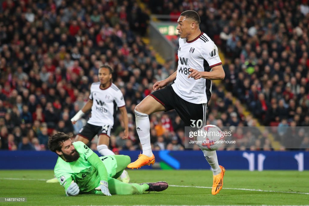 Alisson denies a close range effort from <strong><a  data-cke-saved-href='https://www.vavel.com/en/football/2023/05/03/liverpool-fc/1145773-klopp-lauds-victory-fulham.html' href='https://www.vavel.com/en/football/2023/05/03/liverpool-fc/1145773-klopp-lauds-victory-fulham.html'>Carlos Vinicius</a></strong> (Image by James Gill/Getty Images)