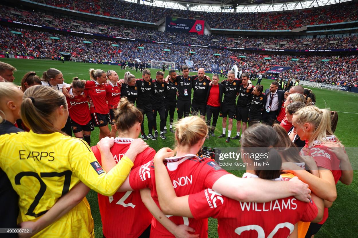 A general view as Marc Skinner, Manager of Manchester United, speaks with their players after the Vitality Women's FA Cup Final between Chelsea FC and Manchester United at Wembley Stadium on May 14, 2023 in London, England. (Photo by Eddie Keogh - The FA/The FA via Getty Images)