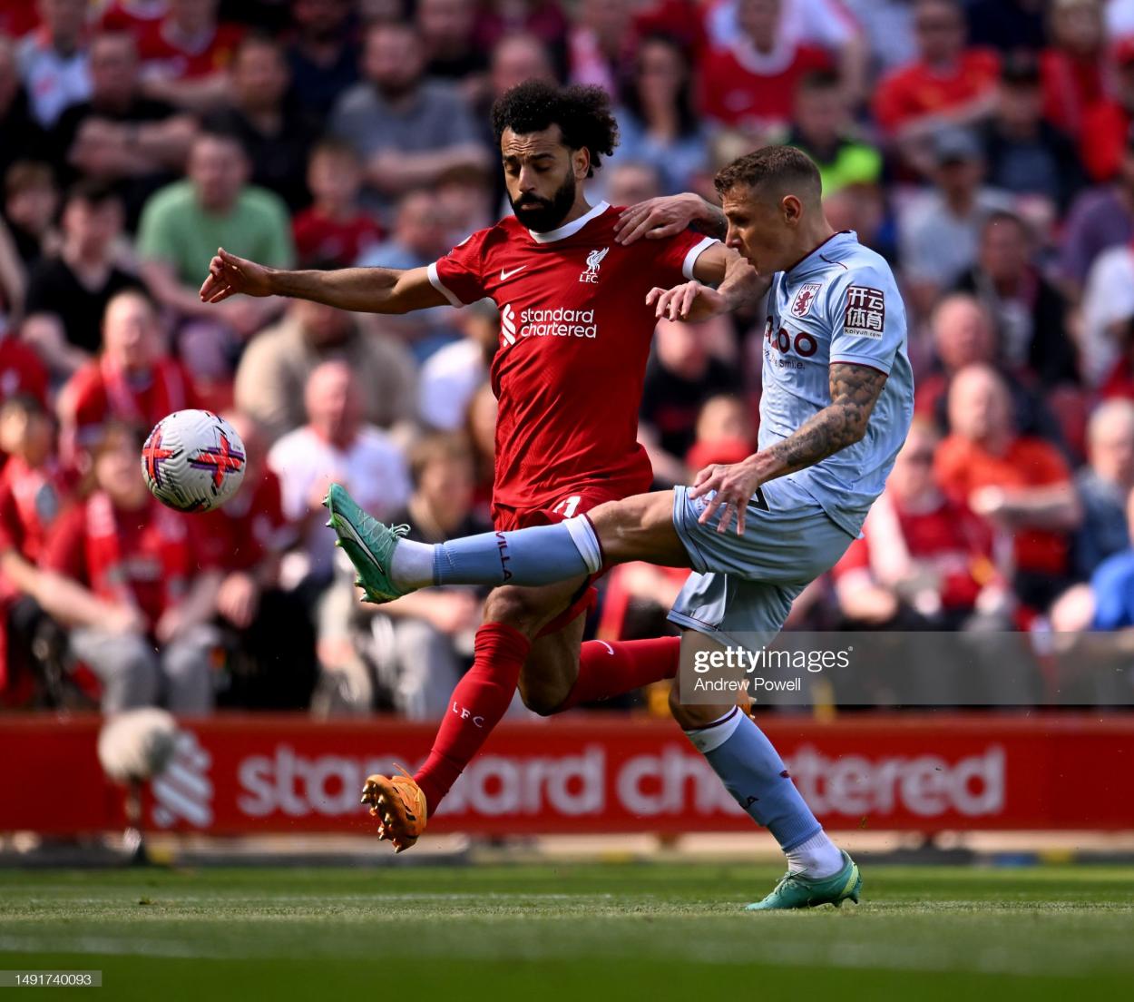 Mohamed Salah battles Lucas Digne for the ball (Image by Andrew Powell/Getty Images)