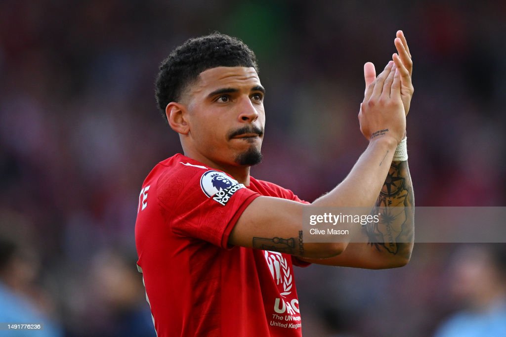 NOTTINGHAM, ENGLAND - MAY 20: Morgan Gibbs-White of Nottingham Forest celebrates after the team's victory, which confirms their place in the Premier League for the next season during the Premier League match between Nottingham Forest and Arsenal FC at City Ground on May 20, 2023 in Nottingham, England. (Photo by Clive Mason/Getty Images)