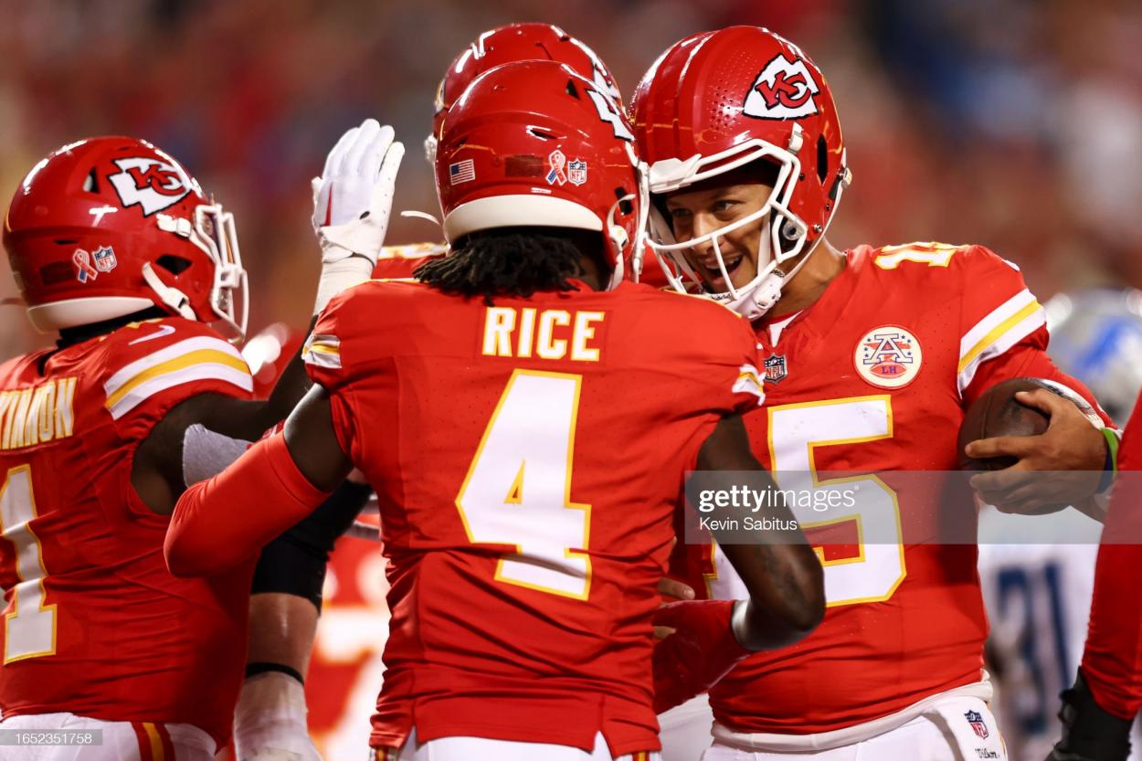  Patrick Mahomes #15 of the Kansas City Chiefs celebrates with Rashee Rice #4 after a touchdown during the second quarter of an NFL football game against the Detroit Lions at GEHA Field at Arrowhead Stadium on September 7, 2023 in Kansas City, Missouri. (Photo by Kevin Sabitus/Getty Images)