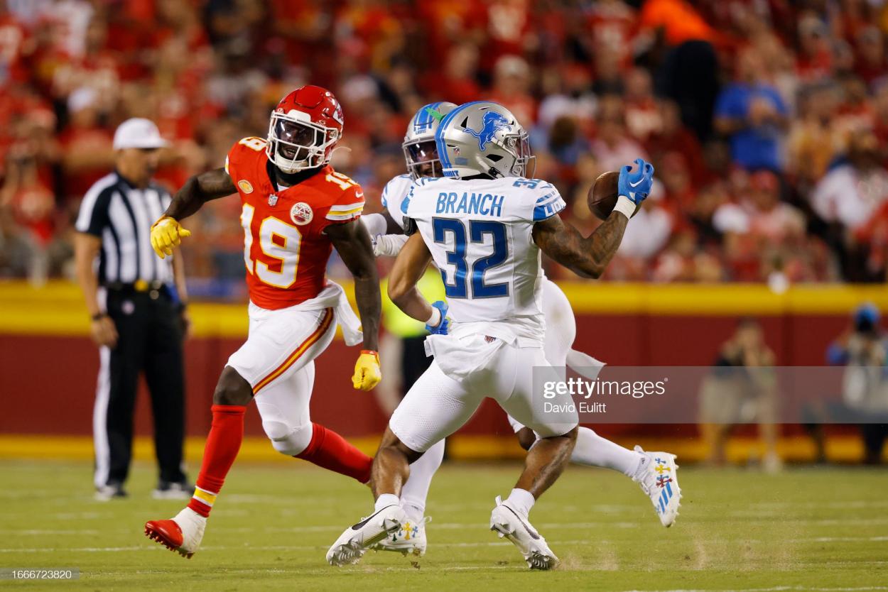 Brian Branch #32 of the Detroit Lions intercepts a pass intended for Kadarius Toney #19 of the Kansas City Chiefs for a touchdown in the third quarter at GEHA Field at Arrowhead Stadium on September 07, 2023 in Kansas City, Missouri. (Photo by David Eulitt/Getty Images)