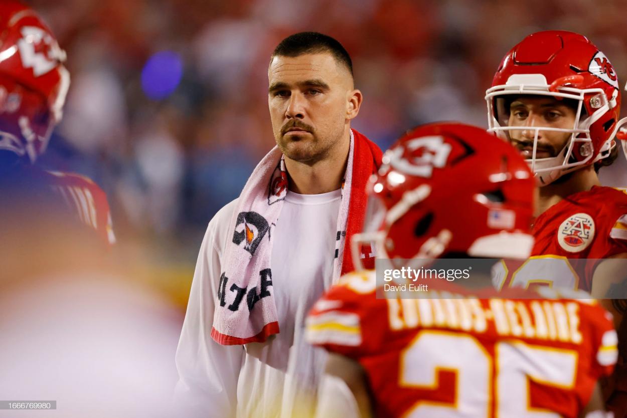  An injured Travis Kelce #87 of the Kansas City Chiefs looks on from the sideline against the Detroit Lions at GEHA Field at Arrowhead Stadium on September 07, 2023 in Kansas City, Missouri. (Photo by David Eulitt/Getty Images)