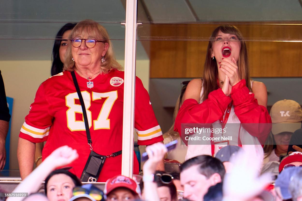 Taylor Swift cheers from a suite with Donna Kelce as the Kansas City Chiefs play the Chicago Bears during the first half at GEHA Field at Arrowhead Stadium on September 24, 2023 in Kansas City, Missouri. (Photo by Cooper Neill/Getty Images)