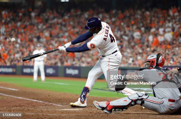 Yordan Alvarez connects for his second home run of Game 1/Photo: Carmen Mandato/Getty Images