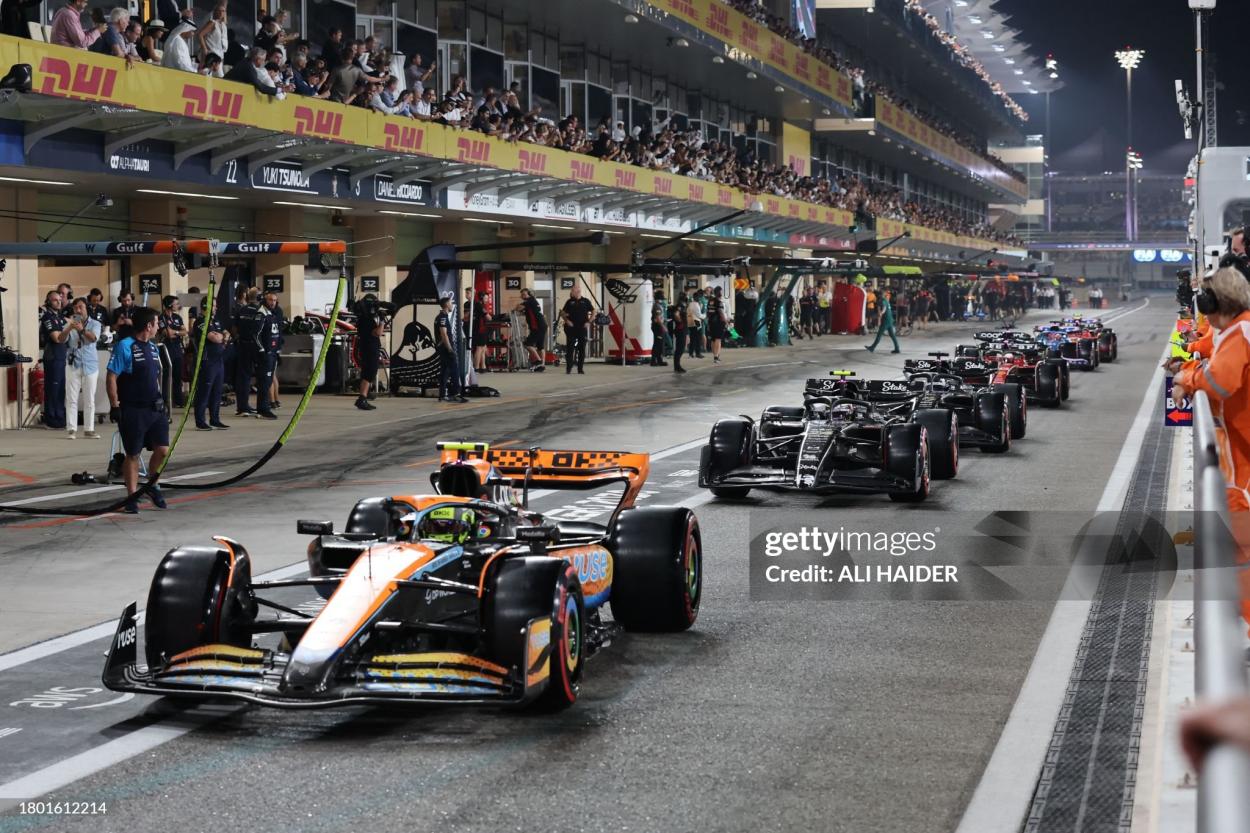McLaren's British driver Lando Norris leaves the pit lane during the qualifying session for the Abu Dhabi Formula One Grand Prix at the Yas Marina Circuit in the Emirati city on November 25, 2023. (Photo by Ali HAIDER / POOL / AFP) (Photo by ALI HAIDER/POOL/AFP via Getty Images)
