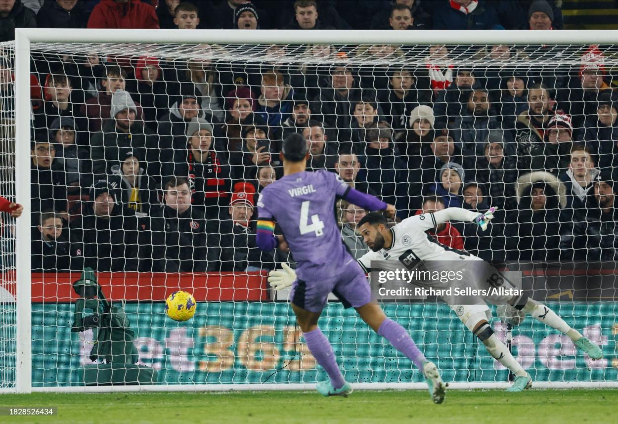 Liverpool captain Virgil van Dijk scores his team's first goal in their 2-0 win over Sheffield United (Photo by Richard Sellers/Sportsphoto/Allstar via Getty Images)