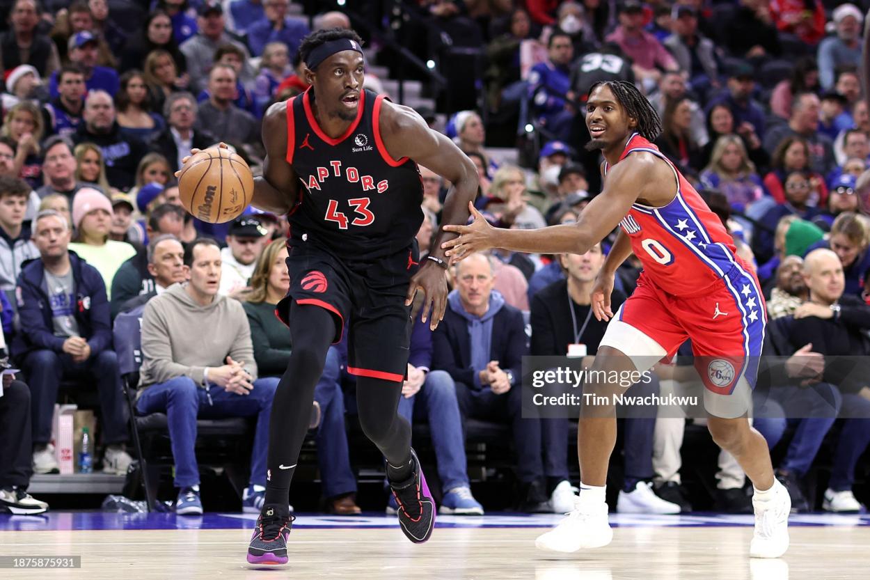 <strong><a  data-cke-saved-href='https://www.vavel.com/en-us/nba/2022/09/27/1124498-raptors-president-masai-ujiri-advocates-for-nba-globalization.html' href='https://www.vavel.com/en-us/nba/2022/09/27/1124498-raptors-president-masai-ujiri-advocates-for-nba-globalization.html'>Pascal Siakam</a></strong> drives past Tyrese Maxey(Photo by Tim Nwachukwu/Getty Images)