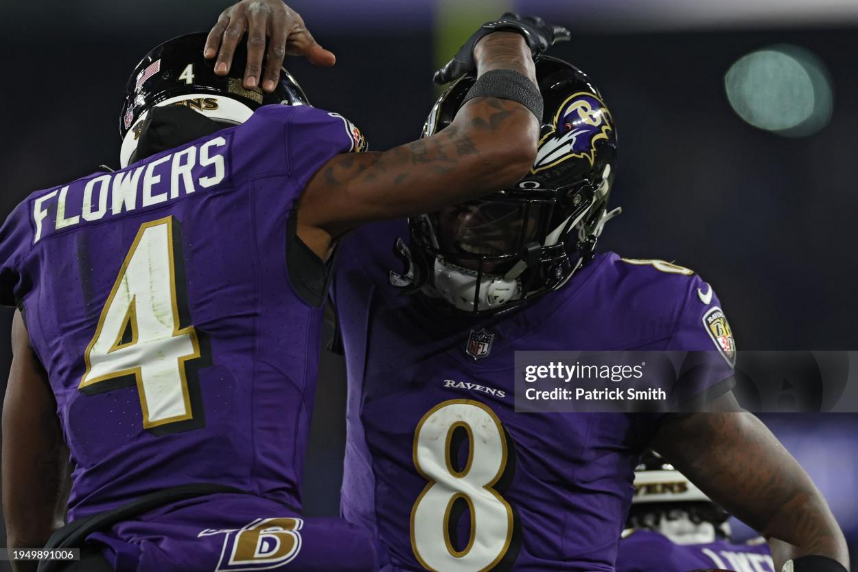 BALTIMORE, MARYLAND - JANUARY 20: Quarterback Lamar Jackson #8 of the Baltimore Ravens celebrates his touchdown against the Houston Texans during the fourth quarter in the AFC Divisional Playoff game at M&T Bank Stadium on January 20, 2024 in Baltimore, Maryland. (Photo by Patrick Smith/Getty Images)