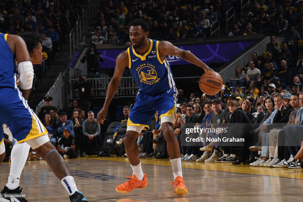SAN FRANCISCO, CA - FEBRUARY 25: Andrew Wiggins #22 of the Golden State Warriors handles the ball during the game against the Denver Nuggets on February 25, 2024 at Chase Center in San Francisco, California. NOTE TO USER: User expressly acknowledges and agrees that, by downloading and or using this photograph, user is consenting to the terms and conditions of Getty Images License Agreement. Mandatory Copyright Notice: Copyright 2024 NBAE (Photo by Noah Graham/NBAE via Getty Images)