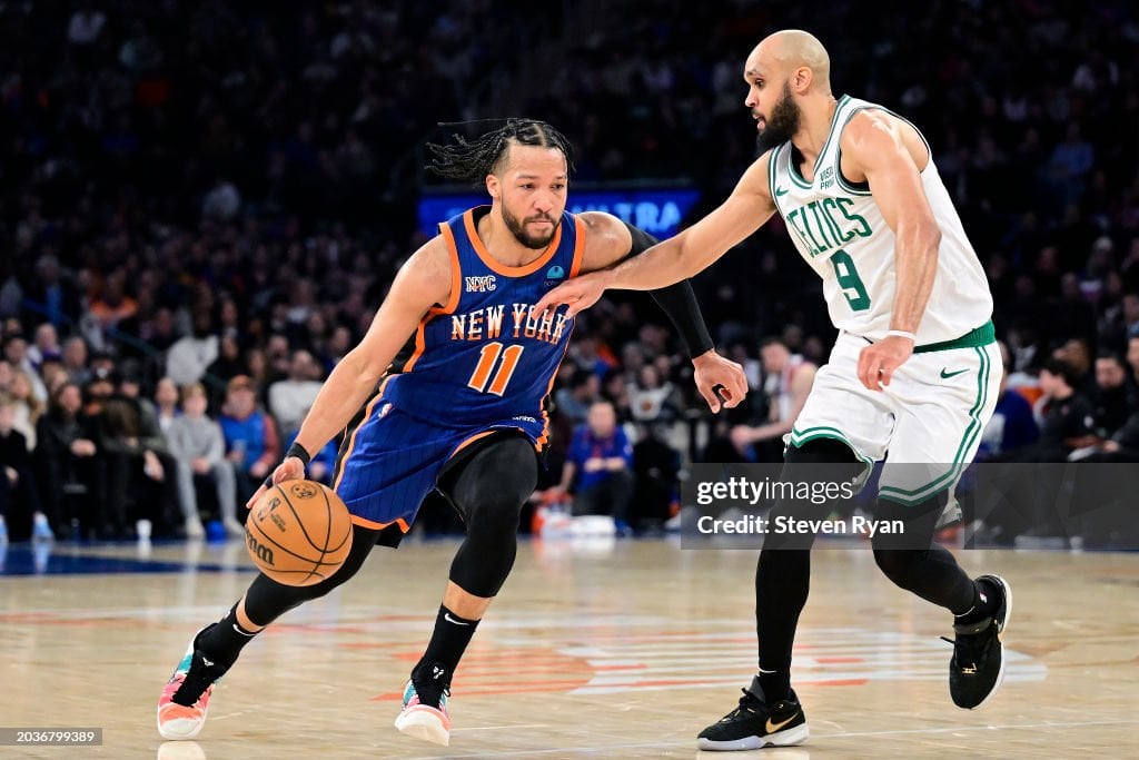NEW YORK, NEW YORK - FEBRUARY 24: Jalen Brunson #11 of the New York Knicks is defended by Derrick White #9 of the Boston Celtics during the second half at Madison Square Garden on February 24, 2024 in New York City. NOTE TO USER: User expressly acknowledges and agrees that, by downloading and or using this photograph, User is consenting to the terms and conditions of the Getty Images License Agreement. (Photo by Steven Ryan/Getty Images)