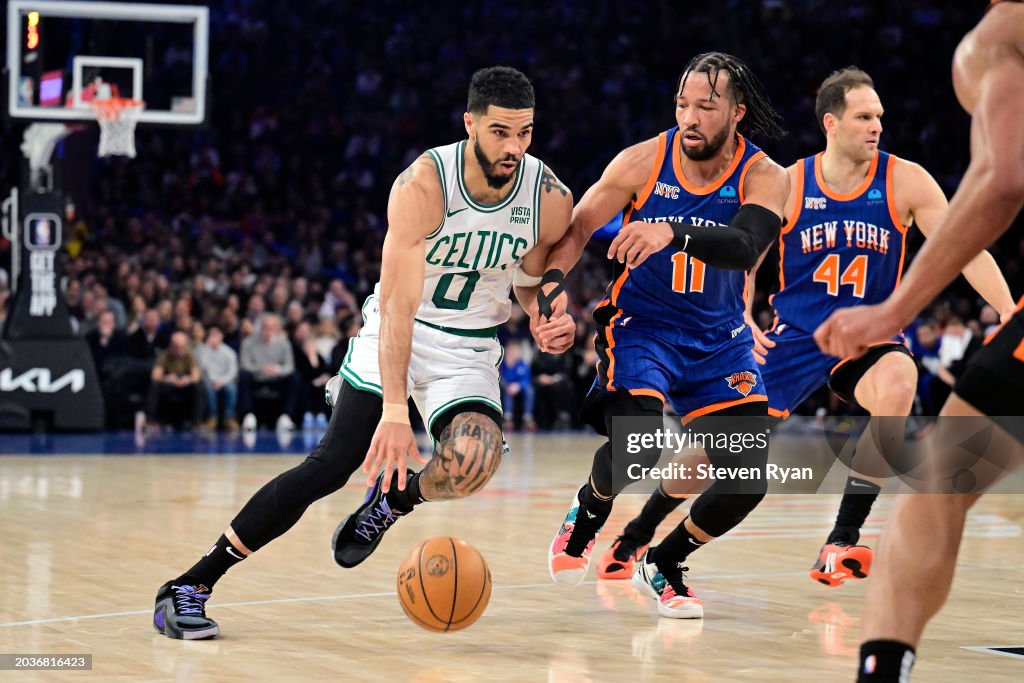 NEW YORK, NEW YORK - FEBRUARY 24: Jayson Tatum #0 of the Boston Celtics is defended by Jalen Brunson #11 of the New York Knicks during the first half at Madison Square Garden on February 24, 2024 in New York City. NOTE TO USER: User expressly acknowledges and agrees that, by downloading and or using this photograph, User is consenting to the terms and conditions of the Getty Images License Agreement. (Photo by Steven Ryan/Getty Images)