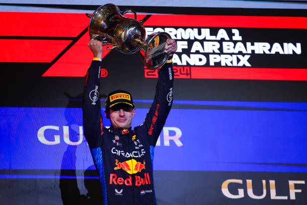  Max Verstappen of Netherland and Oracle Red Bull Racing lift the winner trophy of the F1 Grand Prix of Bahrain at Bahrain International Circuit on March 02, 2024 in Bahrain, Bahrain. (Photo by Eric Alonso/Getty Images )