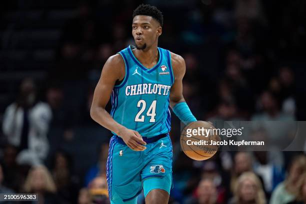 CHARLOTTE, NORTH CAROLINA - MARCH 15: Brandon Miller #24 of the Charlotte Hornets brings the ball up court against the Phoenix Suns during their game at Spectrum Center on March 15, 2024 in Charlotte, North Carolina. NOTE TO USER: User expressly acknowledges and agrees that, by downloading and or using this photograph, User is consenting to the terms and conditions of the Getty Images License Agreement. (Photo by Jacob Kupferman/Getty Images)