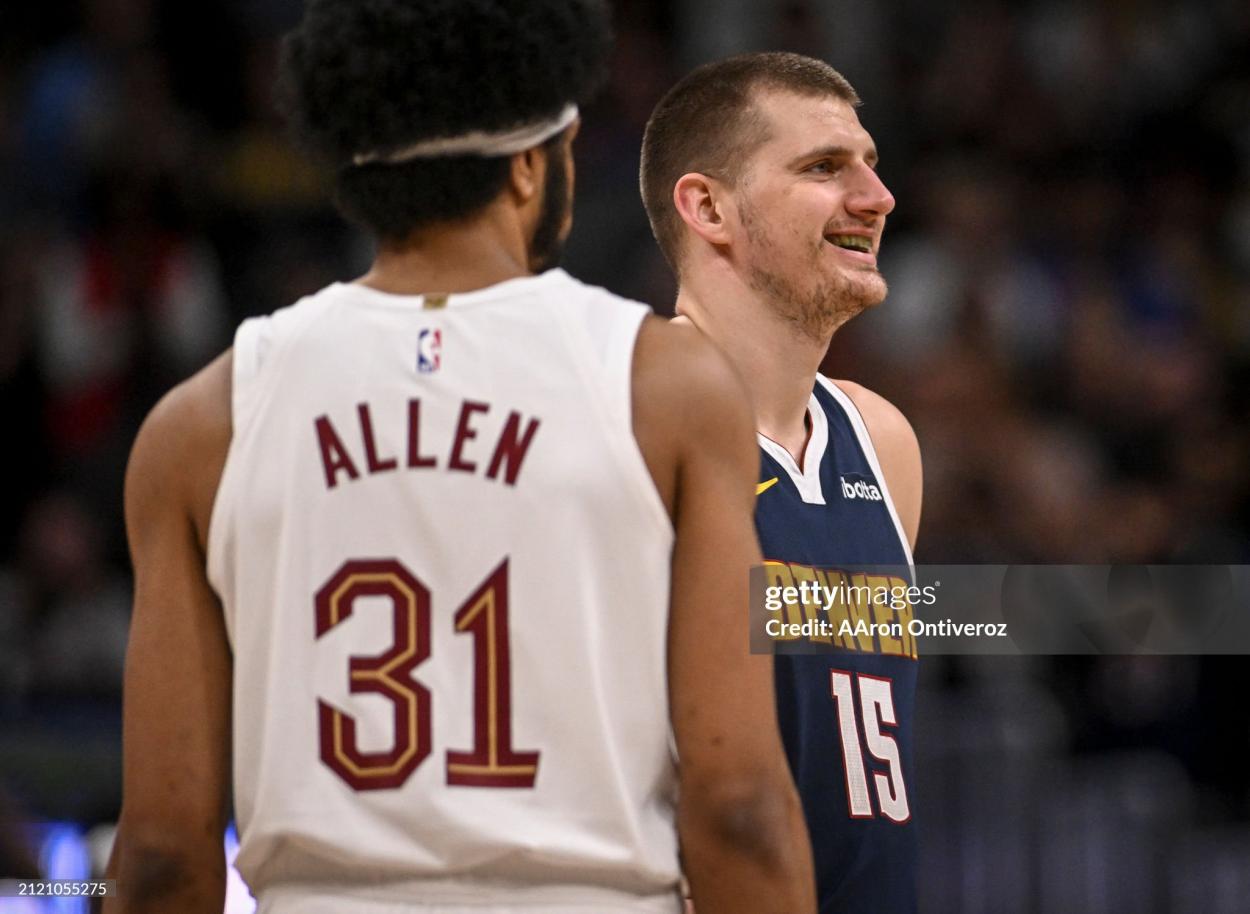 Nikola Jokic smiles into the stands as Jarrett Allen watched on (Photo by AAron Ontiveroz/The Denver Post)